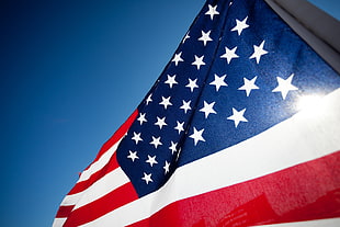 low angle of U.S. A flag on pole