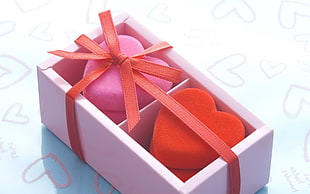 two heart shaped pink and red makeup sponges gift box HD wallpaper