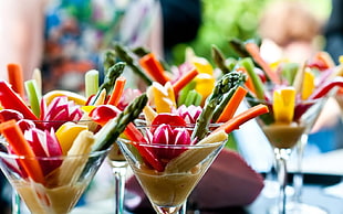 martini glasses with sliced vegetables photography