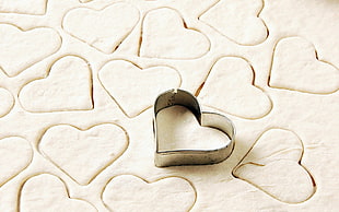 silver heart pastry sorter on dough HD wallpaper