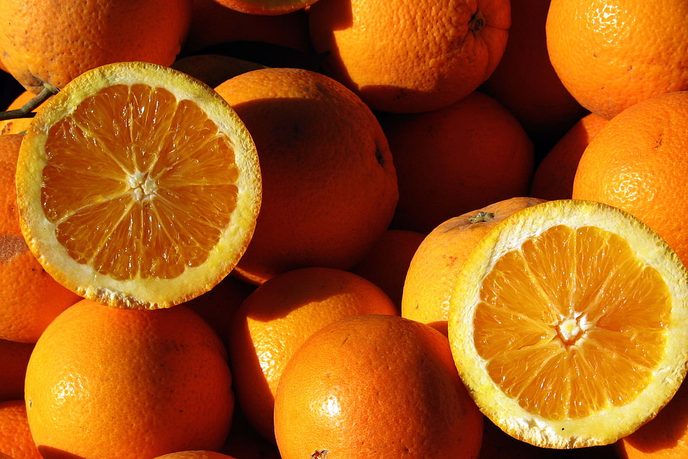 sliced orange fruits HD wallpaper