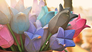 blue, black, and pink wooden flowers