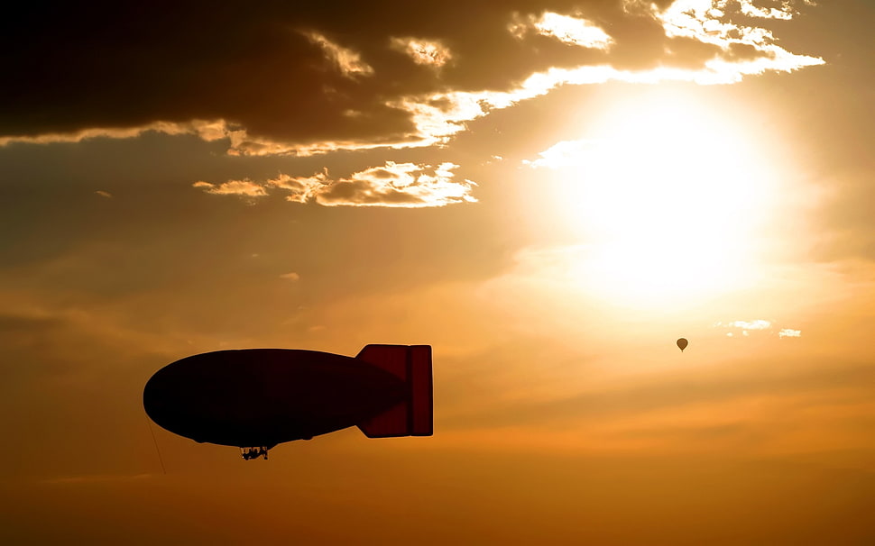 silhouette photography of blimp HD wallpaper