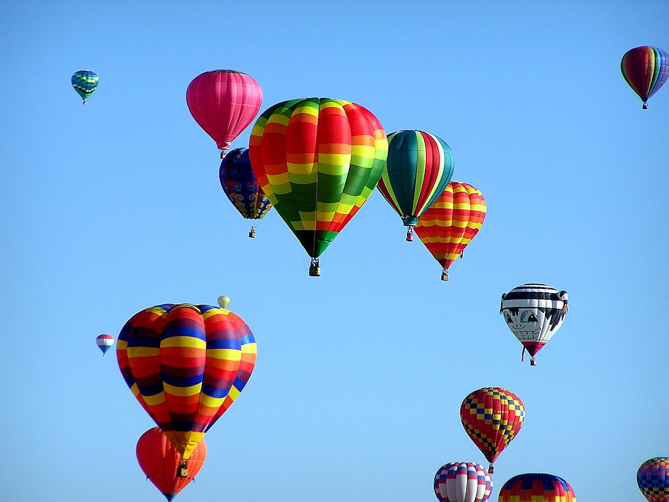 multicolored hot air balloon floating in the sky HD wallpaper