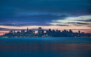 photo of city during sun set HD wallpaper