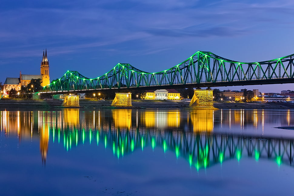 black and white bridge during night time HD wallpaper