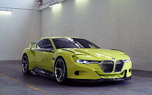 photo of yellow BMW coupe