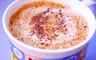 cappuccino on white ceramic mug
