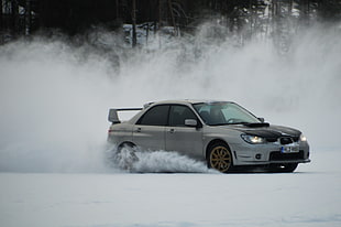 white 5-door hatchback, Subaru, snow, ice, lake