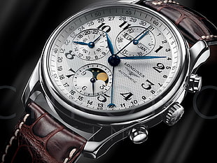round silver-colored Longines chronograph watch displaying 10:07