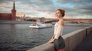 woman standing near body of water HD wallpaper