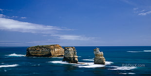 sunlight over stone island and ocean, australia HD wallpaper