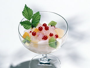 clear glass wine glass with sweets