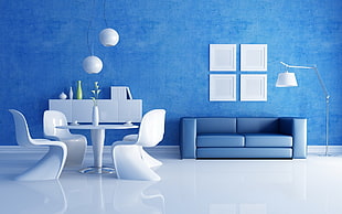 blue leather 2-seat couch and white dining set