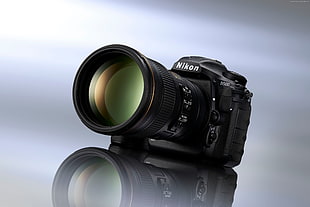 black Nikon DSLR camera photo