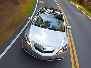 time lapse photography of silver Acura car