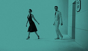 woman and man walking out on store