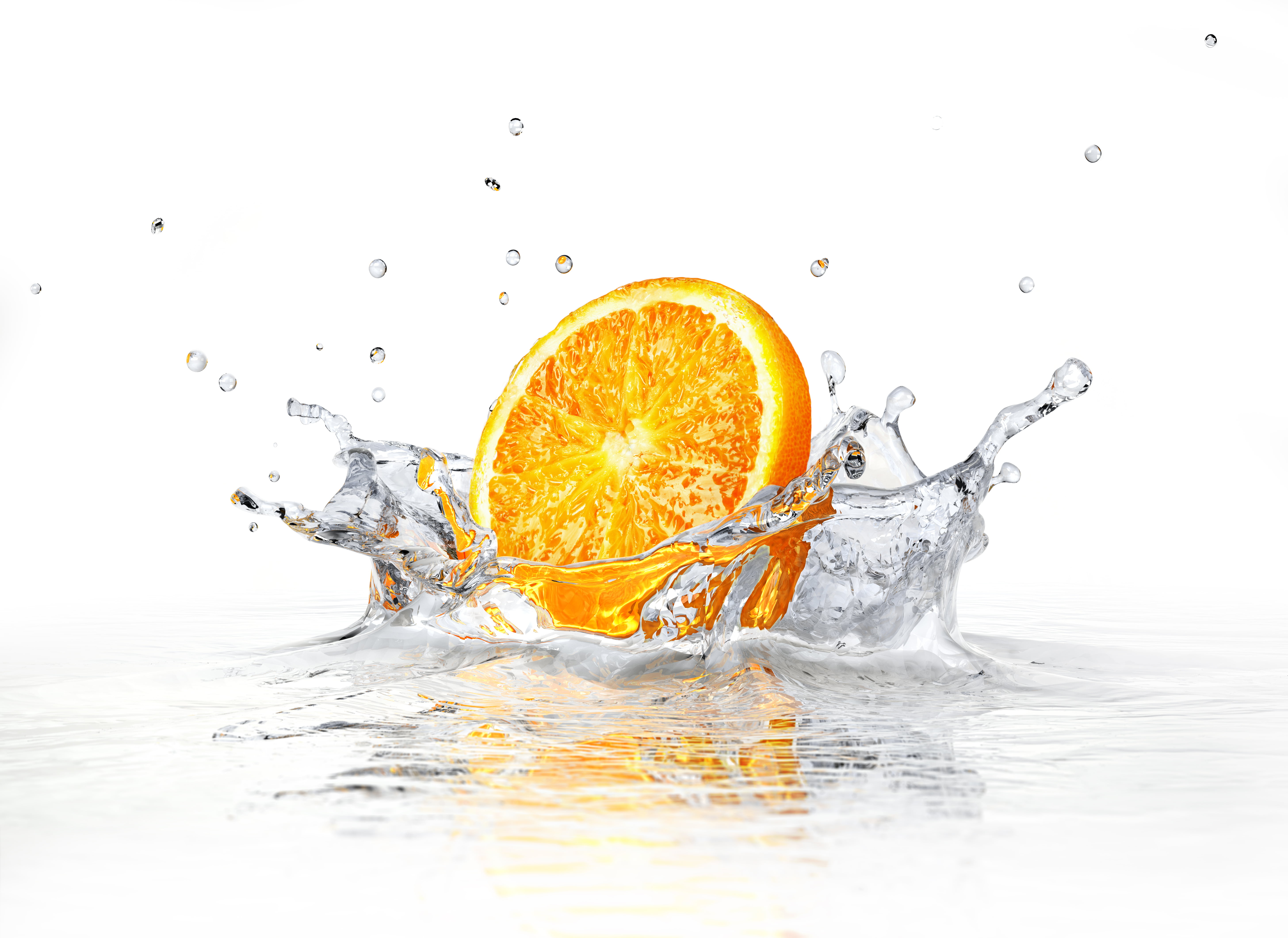 sliced orange fruit on water