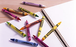 photography of assorted color crayons