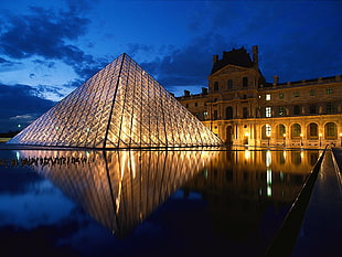 The Louvre Museum in Paris France during nighttime