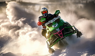 person riding snow mobile HD wallpaper