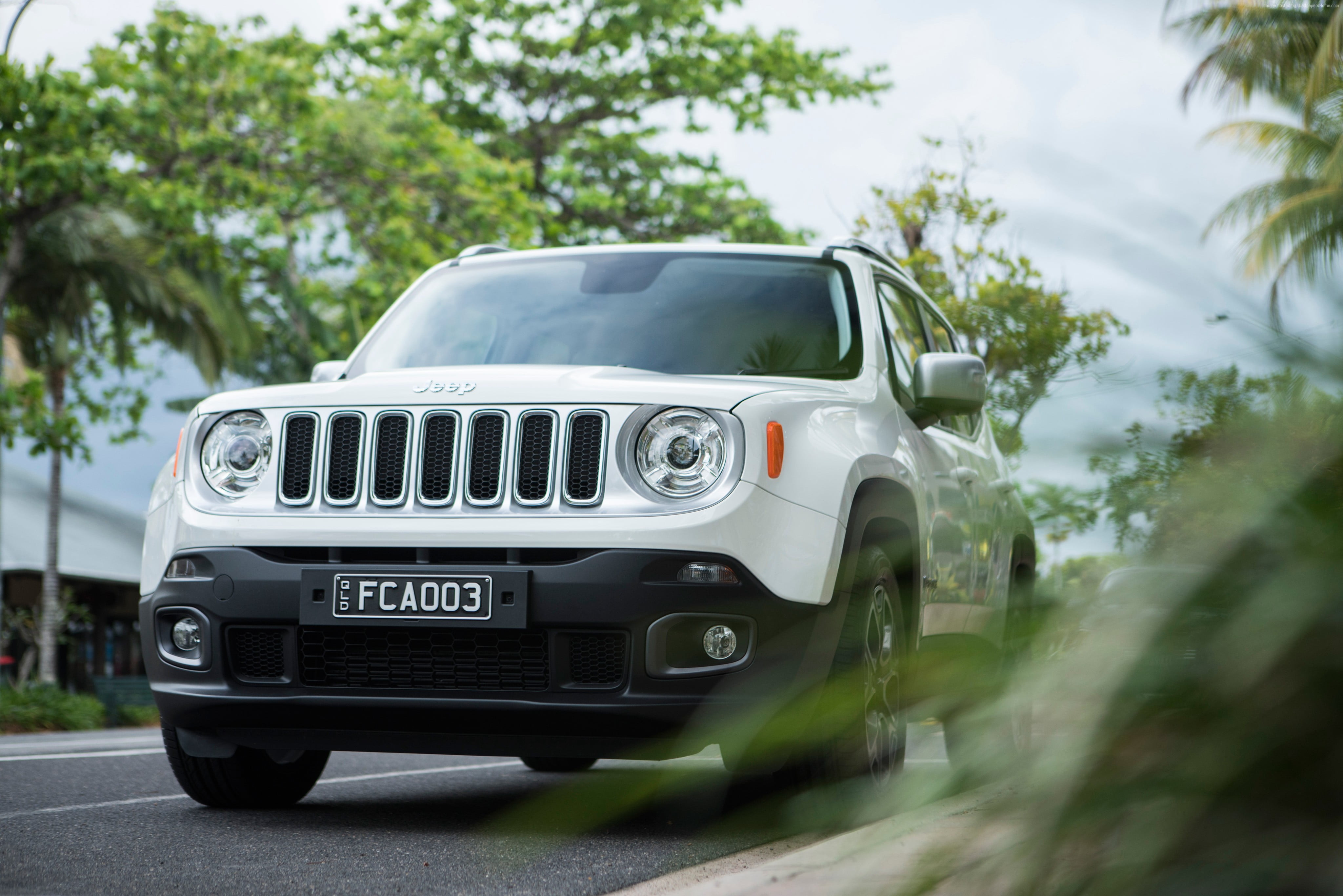 white Jeep sports-utility vehicle on road HD wallpaper.