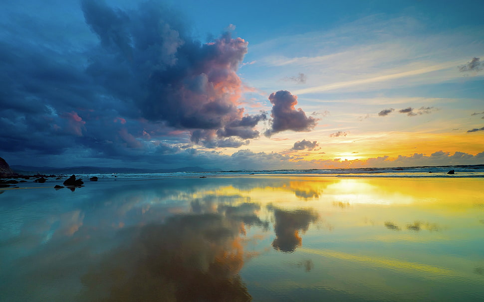 body of water during sunset HD wallpaper