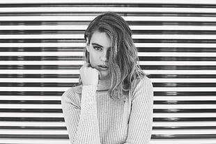 woman in knit turtle-neck long-sleeved top grayscale portrait photo