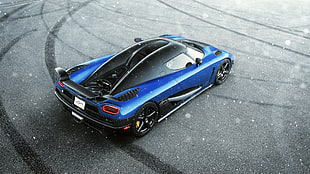 aerial view of black and blue coupe