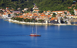 red sailtboat, Korčula, Croatia, sea, cityscape