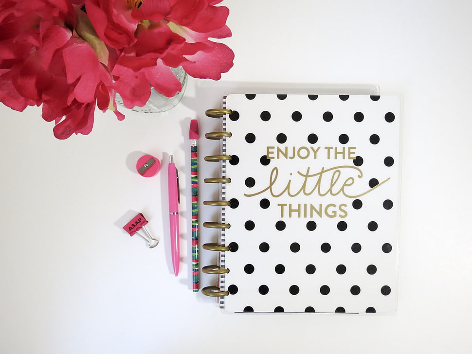 Enjoy The Little Things printed notebook beside pens HD wallpaper