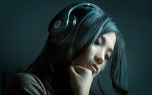 woman wearing beat by Dr. Dre headphones HD wallpaper