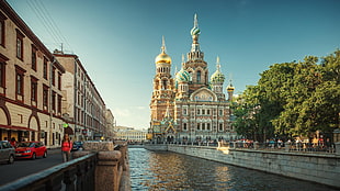 beige and green church, city, river, promenades, St. Petersburg