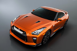 photo of orange Nissan GT-R