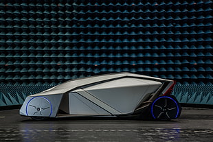 gray concept vehicle with blue background
