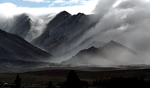 photo of smoky mountain during daytime, nz