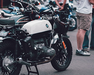 white and black BMW standard motorcycle