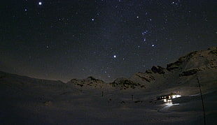 brown mountain, night sky, stars, snow, horizon