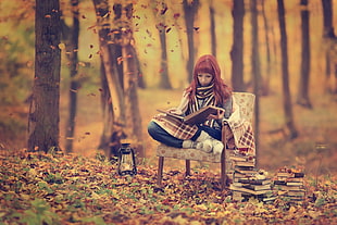 woman siting on bench in forest HD wallpaper