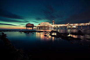photo of black and brown painted building during nighttime