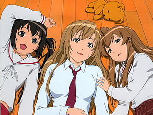 three female anime characters lying on the floor