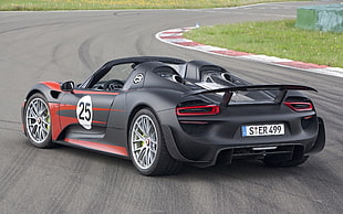 gray and red Porsche 918 on the road