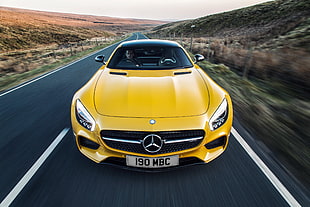 yellow Mercedes-Benz car