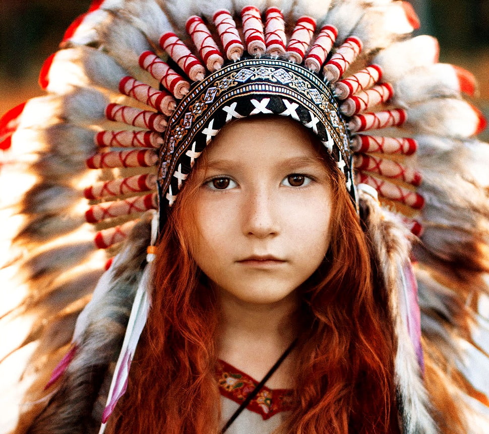selective focus photography of girl wearing native american headdress HD wallpaper