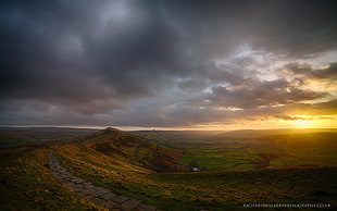 hills covered by green and yellow plants under cloudy sky during sunset, mam tor