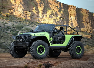 green and black Jeep Wrangler