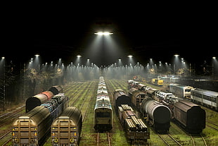 brown and gray trains, train, railway, night, lights HD wallpaper