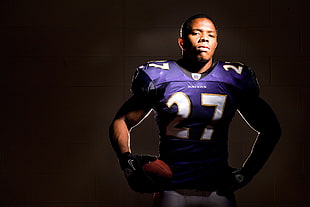 photo of Baltimore Ravens NFL player with black background