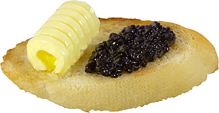 brown sliced bread with cheese and black spread
