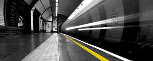 black floor tiles, subway, yellow, long exposure, London